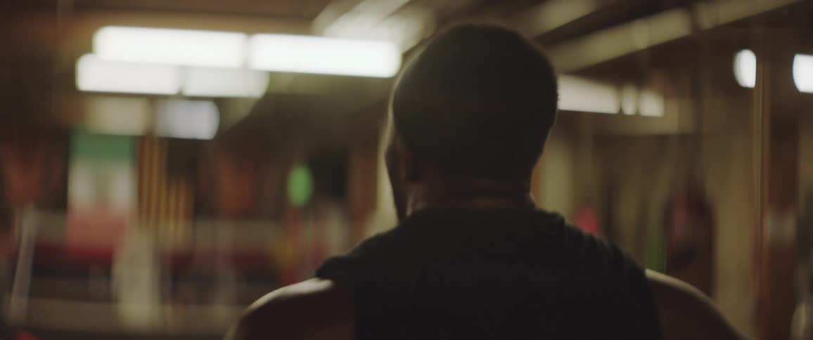 A man walks through a gym