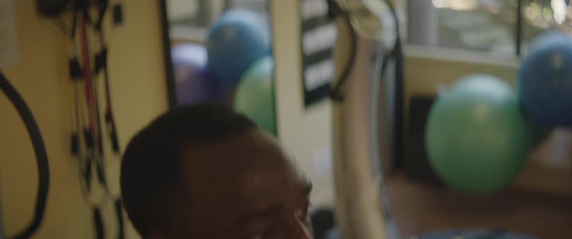 A man exercises in a gym