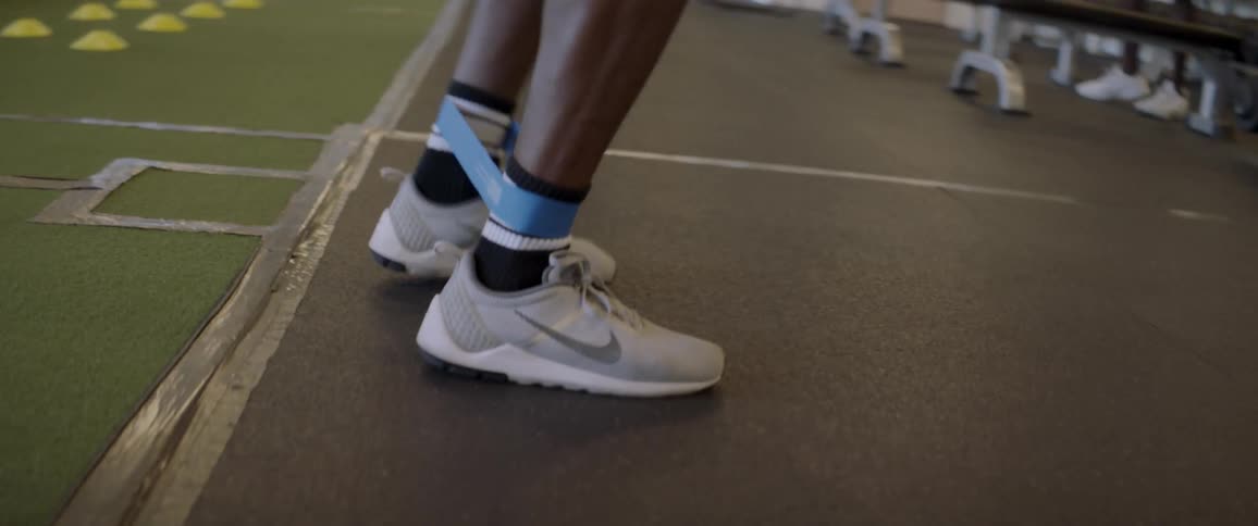 A man performs footwork exercises
