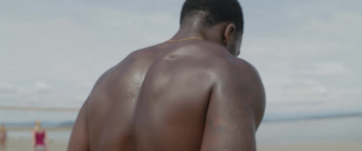 A man walks on the beach