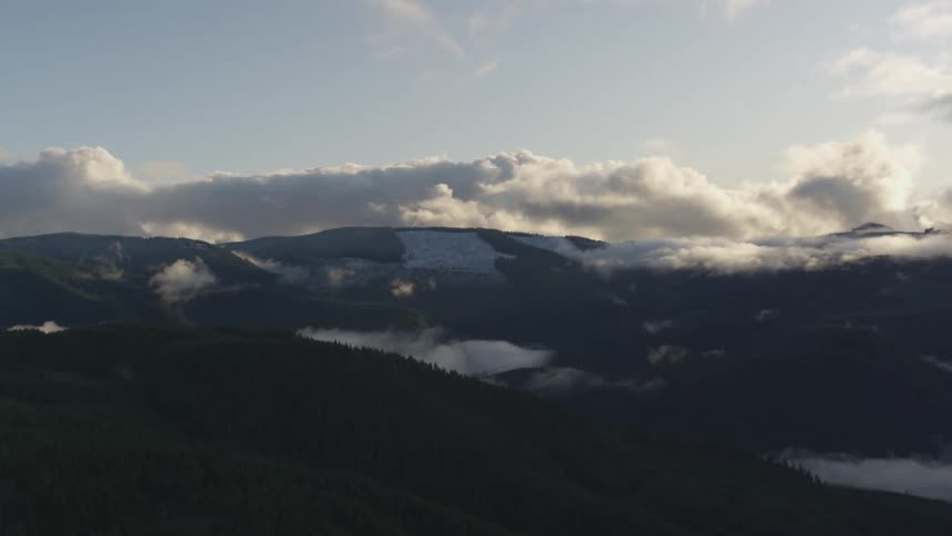 Heavy clouds move over the mountains
