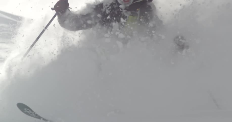 A skier floats through deep powder