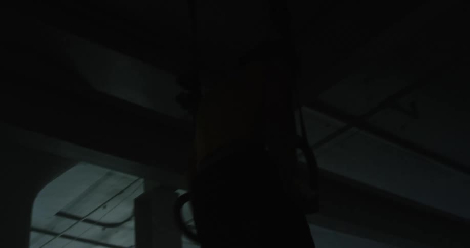 A man is using exercise equipment