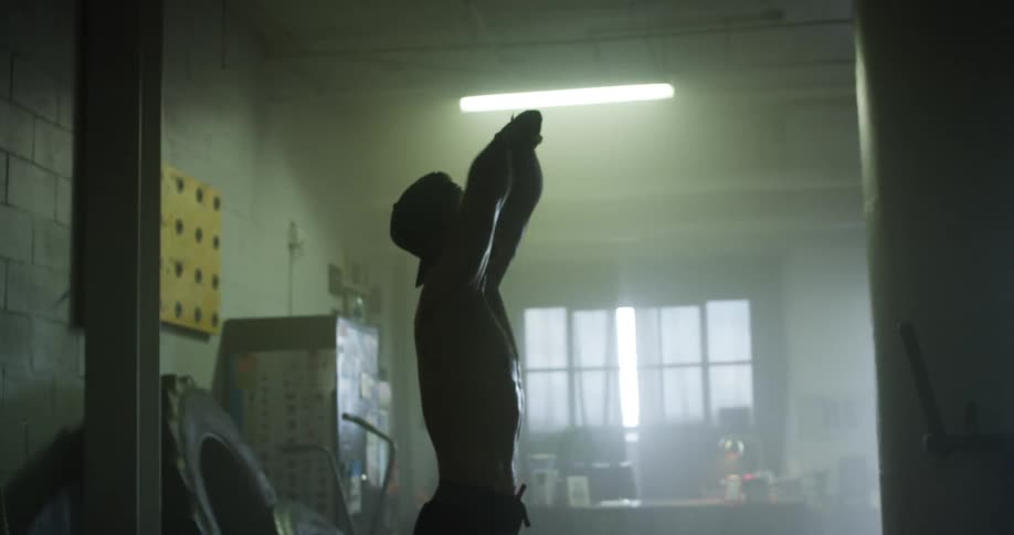 A man is working out in a gym