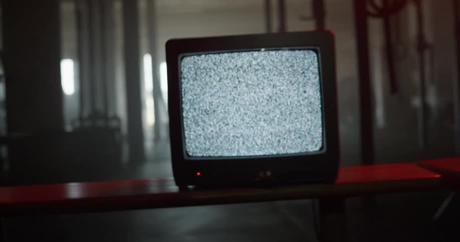 An old television set displaying static