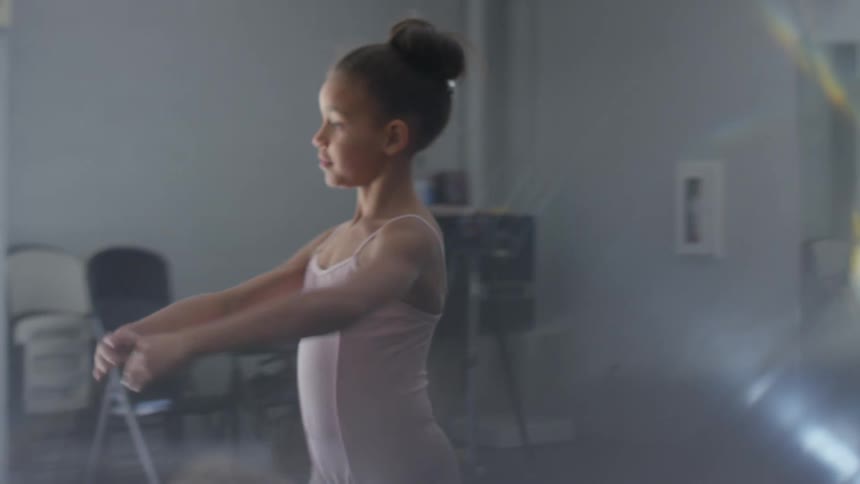 Dancer spins inempty dance studio