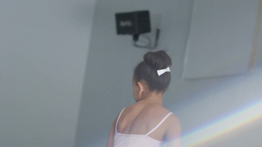 A girl is dancing ballet