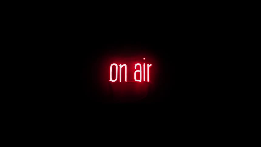On Air neon sign lights up