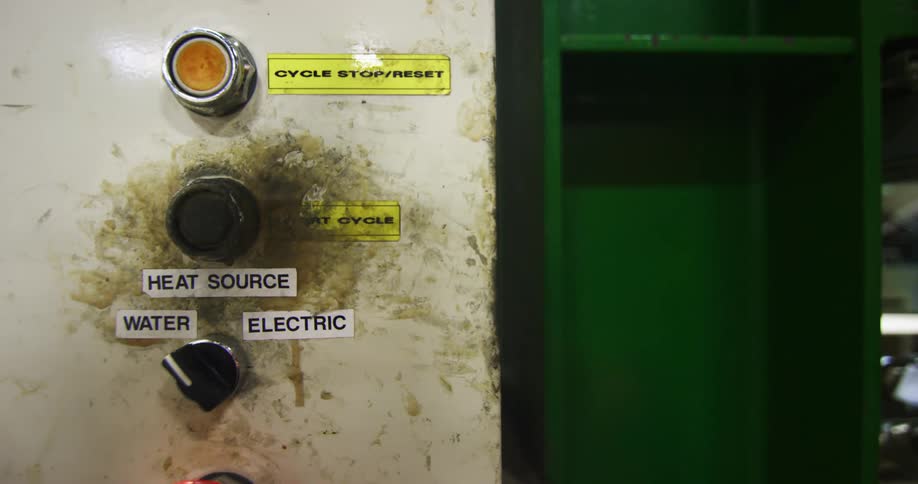 A man quickly pushes a button