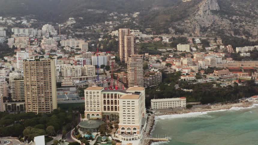 An aerial view of a downtown city is displayed