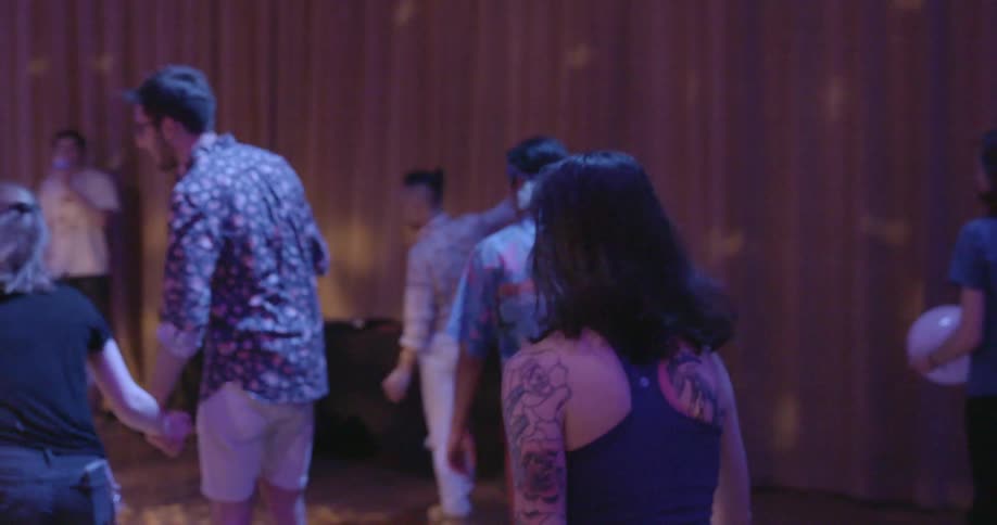 People are skating in a roller rink