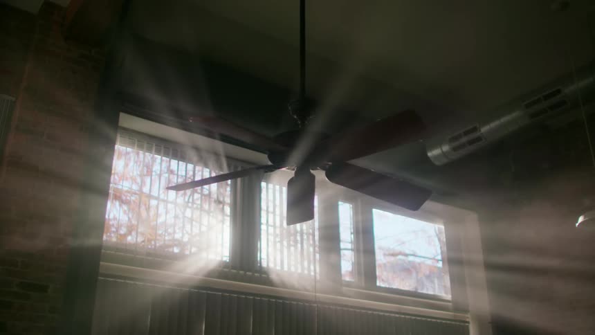 A fan spinning in a room in a home