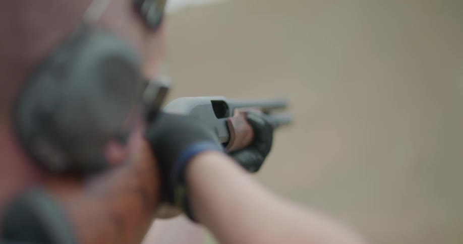 A man shooting a gun