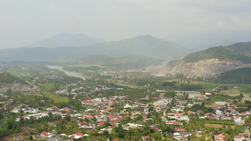 An aerial view of a city is displayed
