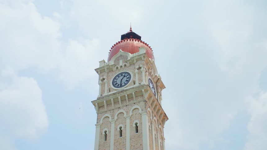 A clock tower on a cloudy day