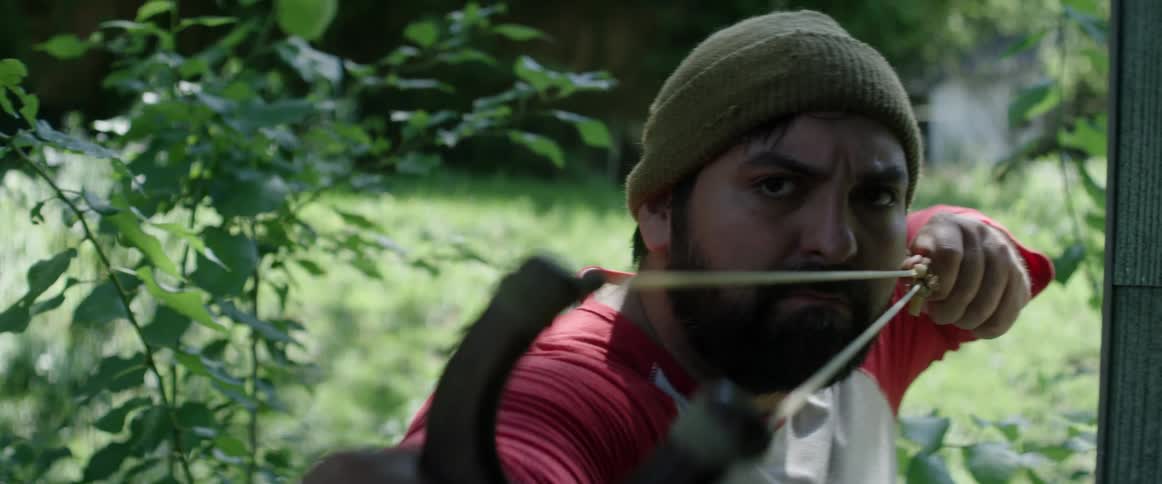 A man shooting a sling shot