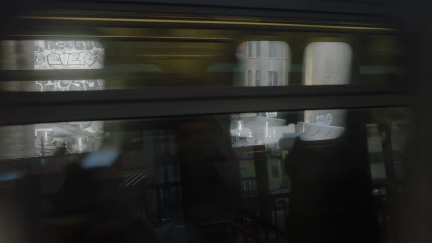 A city train passes by