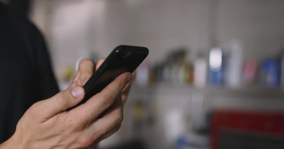 A person using a smartphone screen