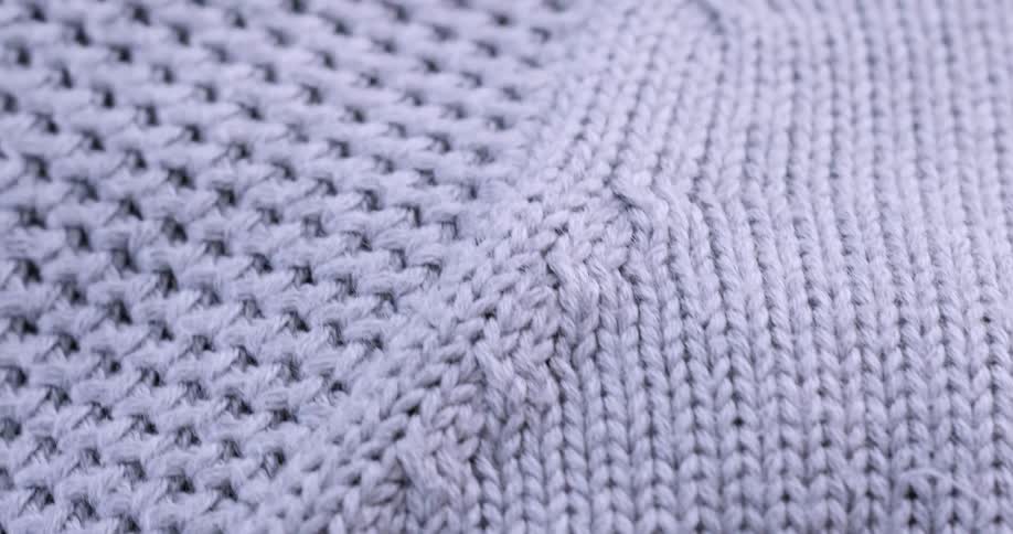 A piece of woven fabric that is light in color