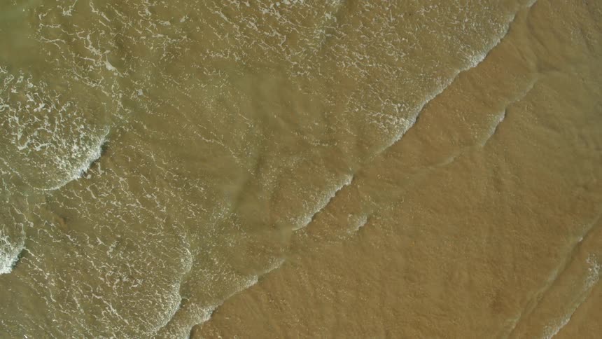 Ocean waves are moving towards the coast