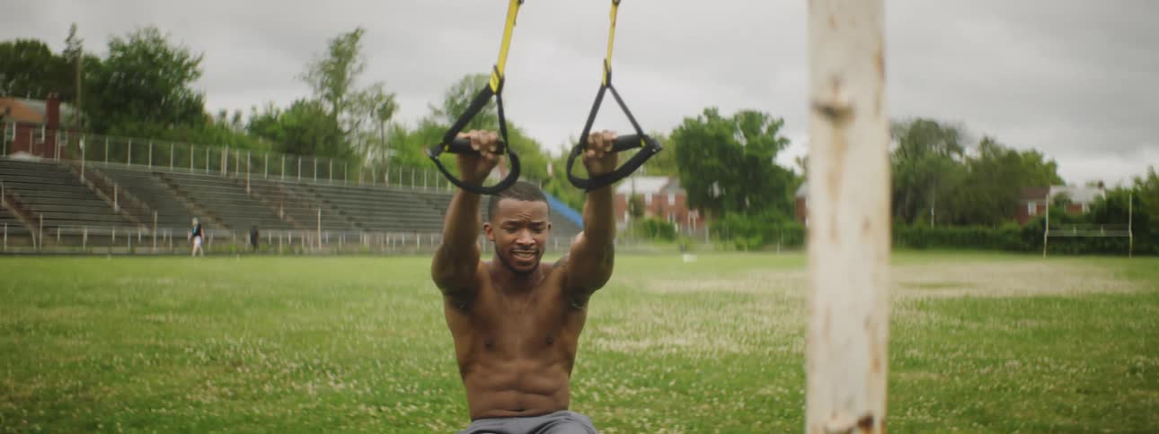 A man is exercising outdoors in spring