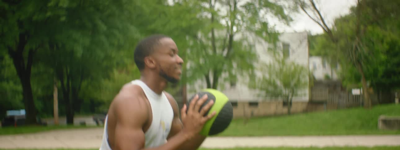 A man is exercising outdoors in spring