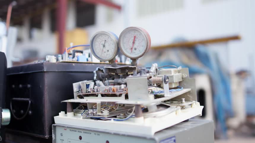 Vintage small machine with gauges and wires