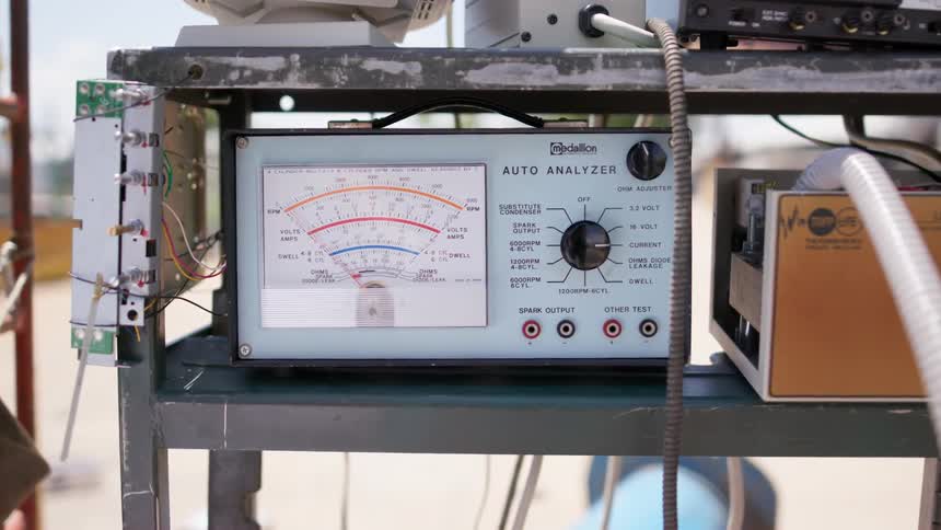An auto analyzer sits on a shelf