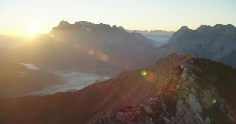 A mountain range with peaks near the sky