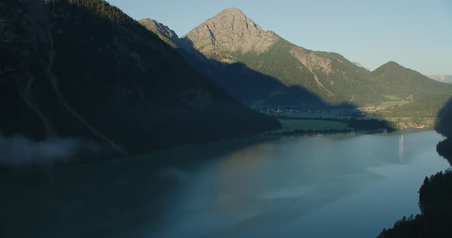 Lake in valley between mountains