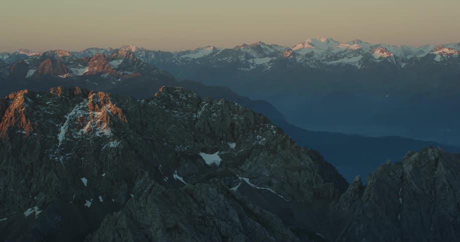 The mountains are topped with snow