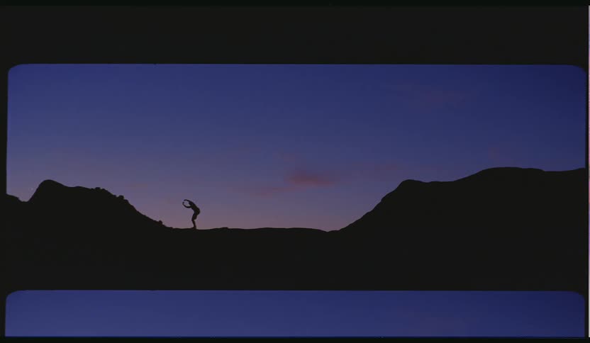 A person is dancing on the hills ahead