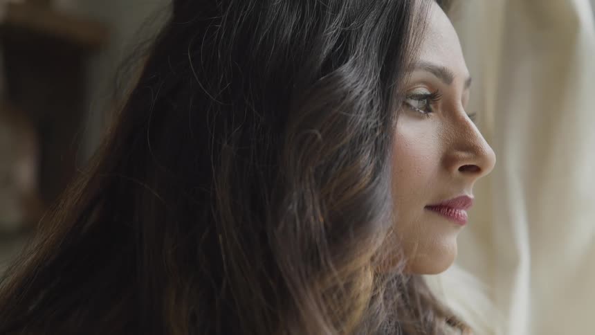 A woman looking out the window