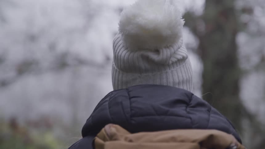 A woman walking outside