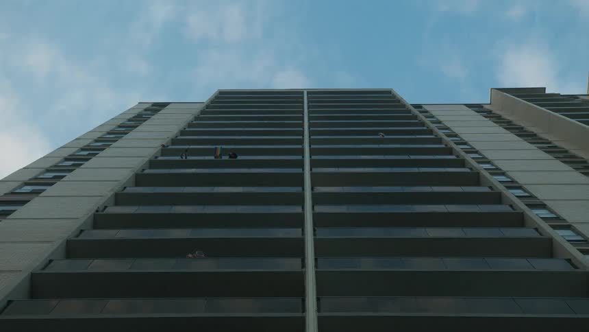 People bang on saucepans with spoons on their balconies