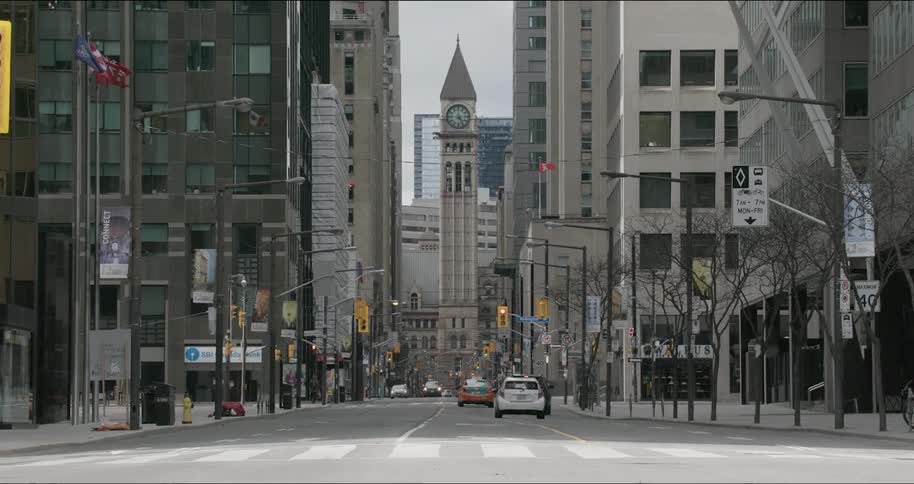 Cars and people in a downtown area
