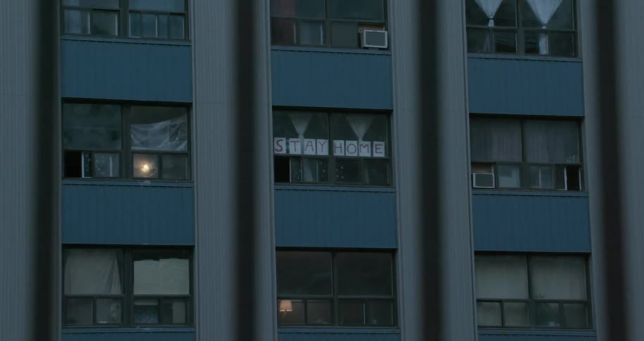 A building with a window with a sign on it