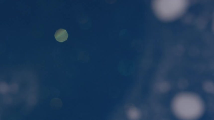 Blue white and gray colors that look like water and ice