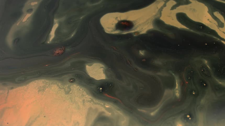 The different color paints mix together