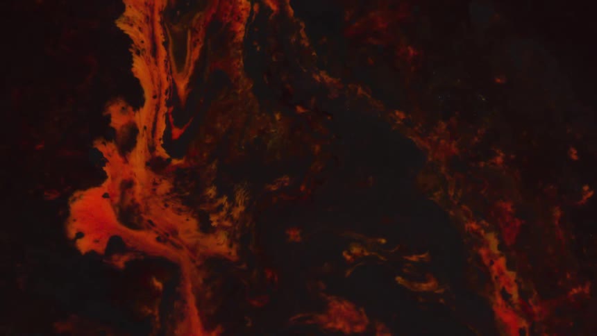 Abstract colorful red and black paint ink liquid diffusion with movement