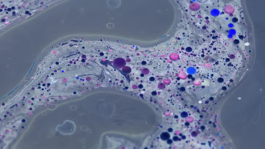 Gray blue pink and purple colors that look like oil and water