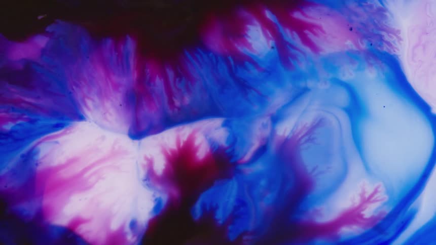 Flowing purple and blue liquid