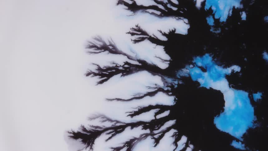 Flowing black and blue liquid