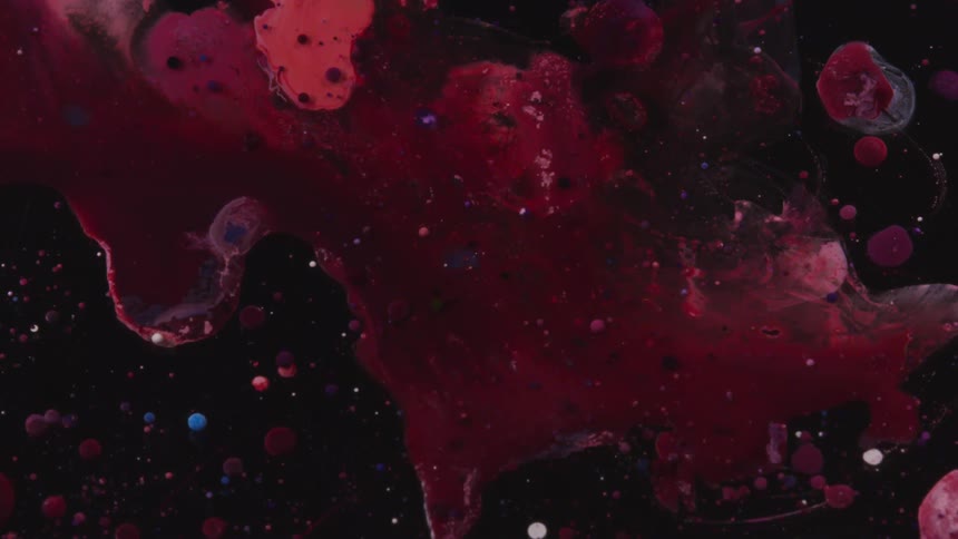 Flowing red and black liquid