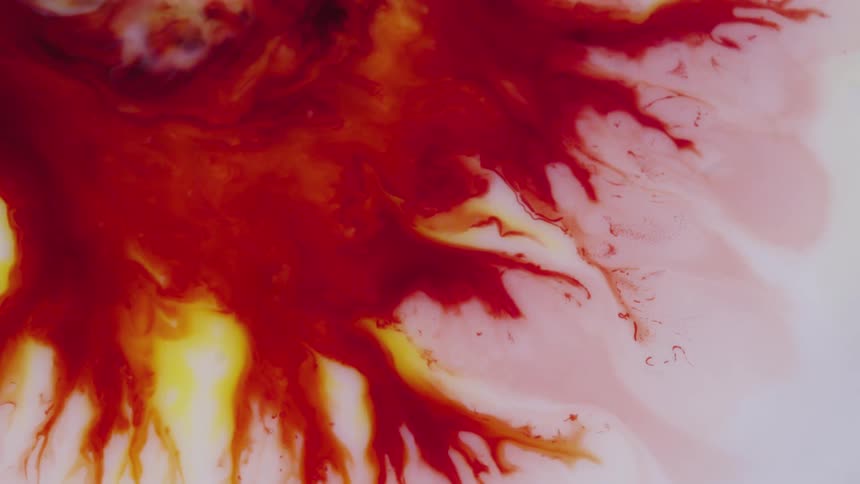 Flowing red and yellow liquid