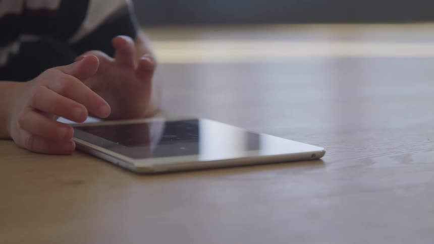 Young child using tablet