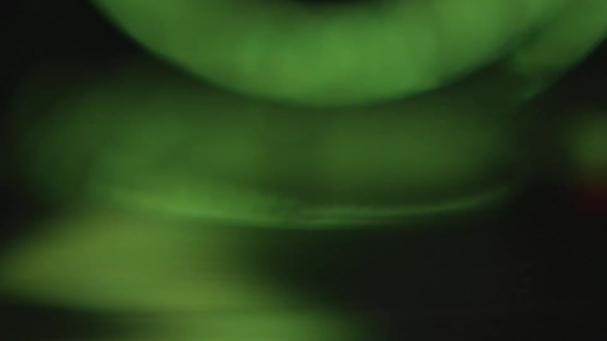 Green and black light and shadow in abstract pattern