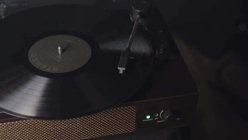 Record spins on record player in room