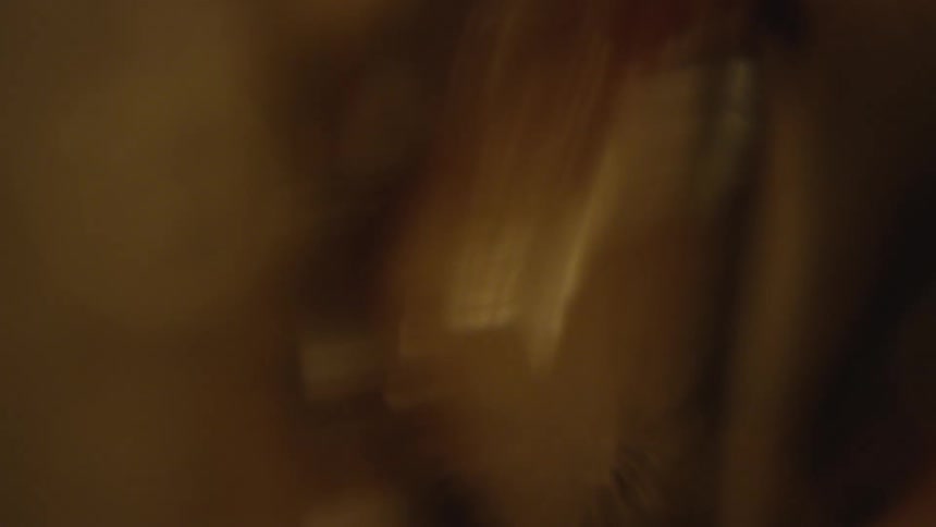 Movement of a brown and yellow liquid