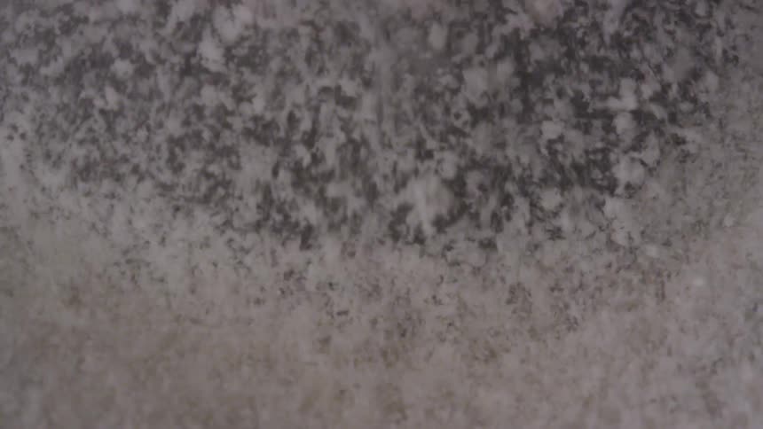 A white powder shaking and vibrating